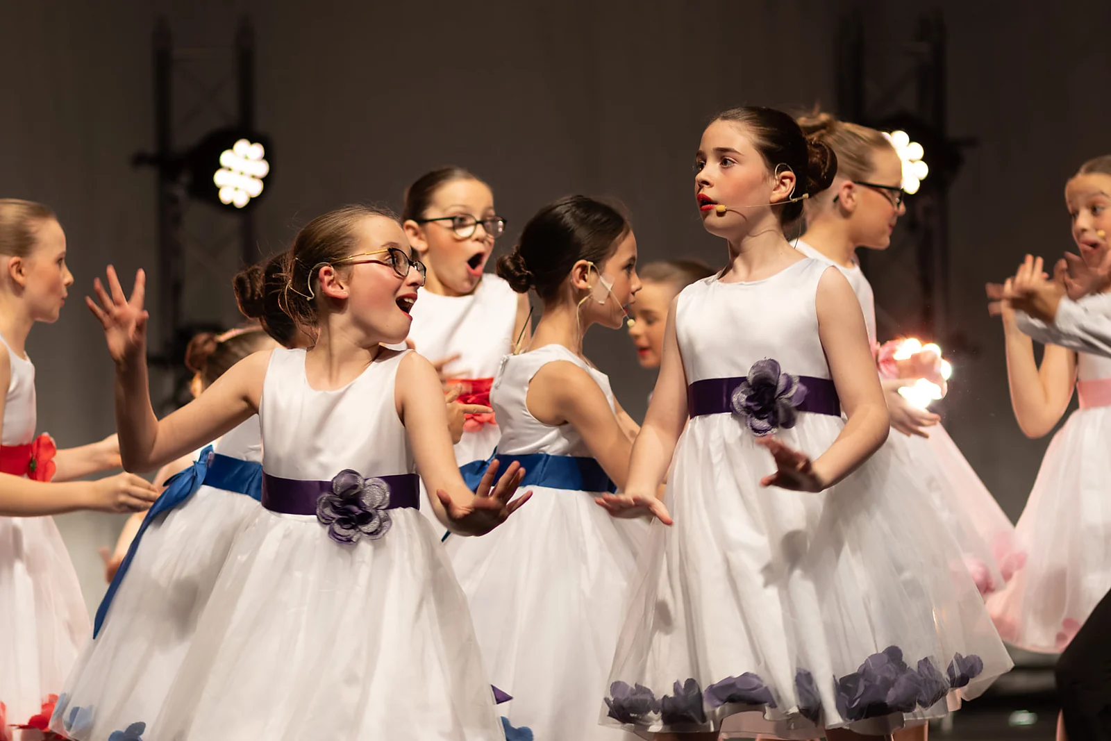KWA junior cast dancing in white dresses